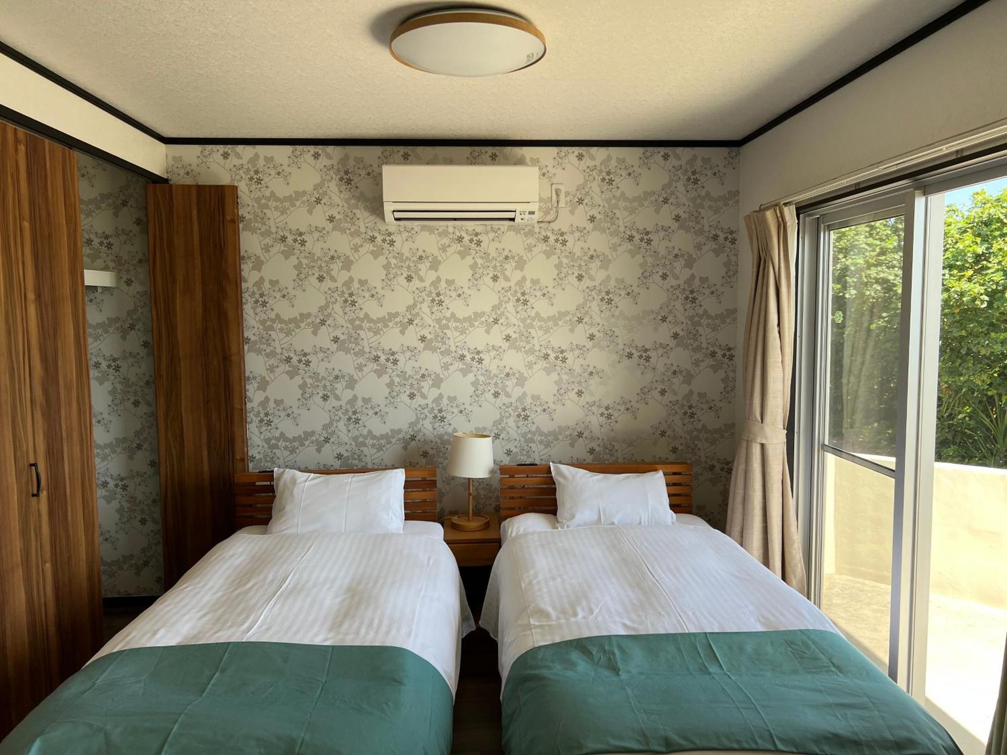 Ferienwohnung Ocean Front Sumuide Nago Exterior foto